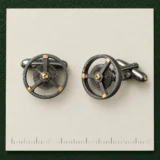 Balance Wheel Cufflinks on a millimetre scale card