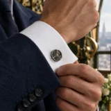 Balance Wheel Cufflinks worn with a wedding suit
