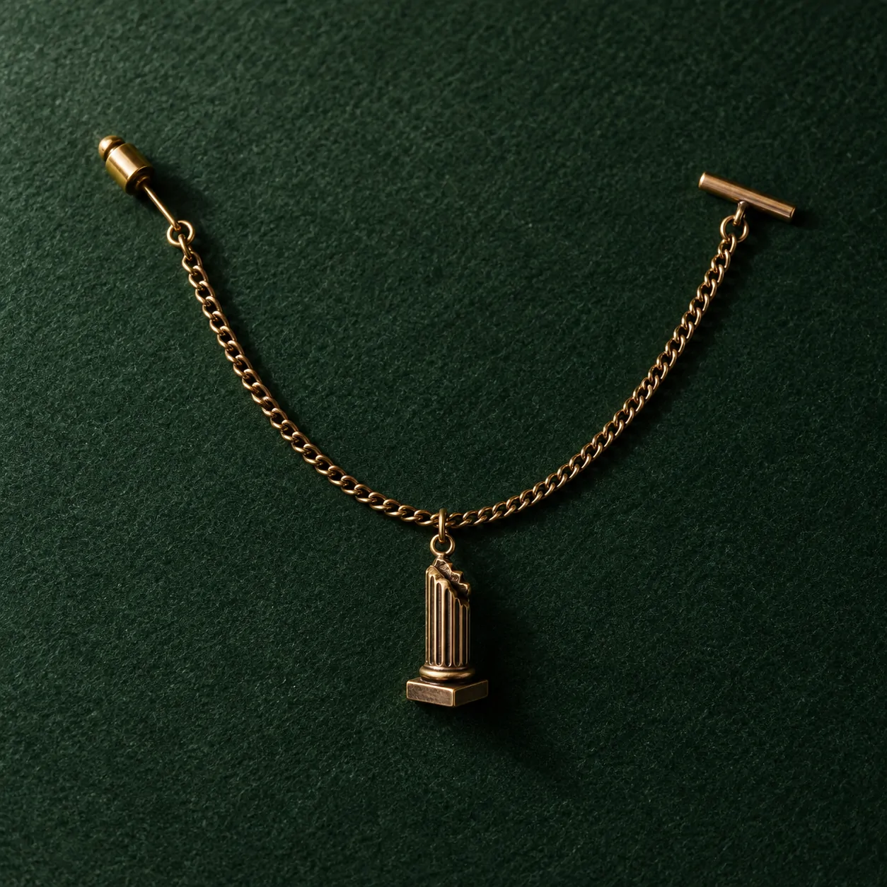 Broken Column Lapel Chain, front view on green felt