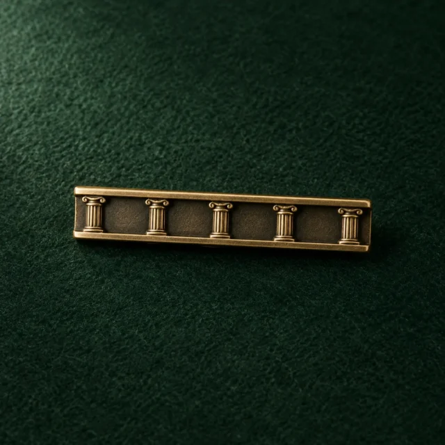 Colonnade Tie Bar, front view on green felt