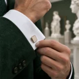 Cracked Tablet Cufflinks worn with a wedding suit