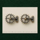 Escapement Wheel Cufflinks on a millimetre scale card