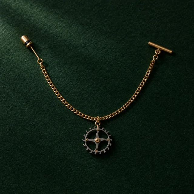 Escapement Wheel Lapel Chain, front view on green felt