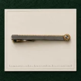 Gear Rack Tie Bar on a millimetre scale card