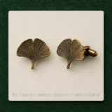 Ginkgo Leaf Cufflinks on a millimetre scale card