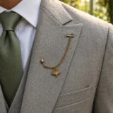 Ginkgo Leaf Lapel Chain worn with a wedding suit