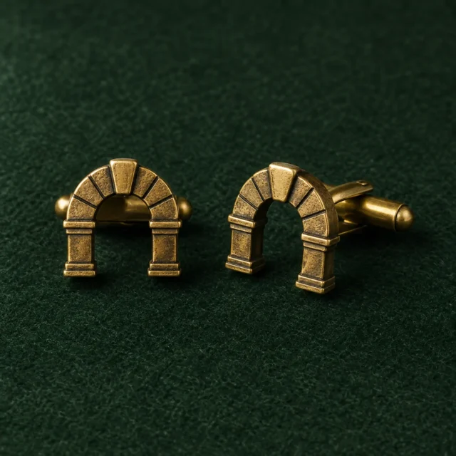 Keystone Arch Cufflinks, front view on green felt