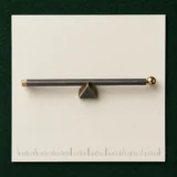 Lever Tie Bar on a millimetre scale card