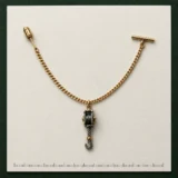 Pulley Block Lapel Chain on a millimetre scale card