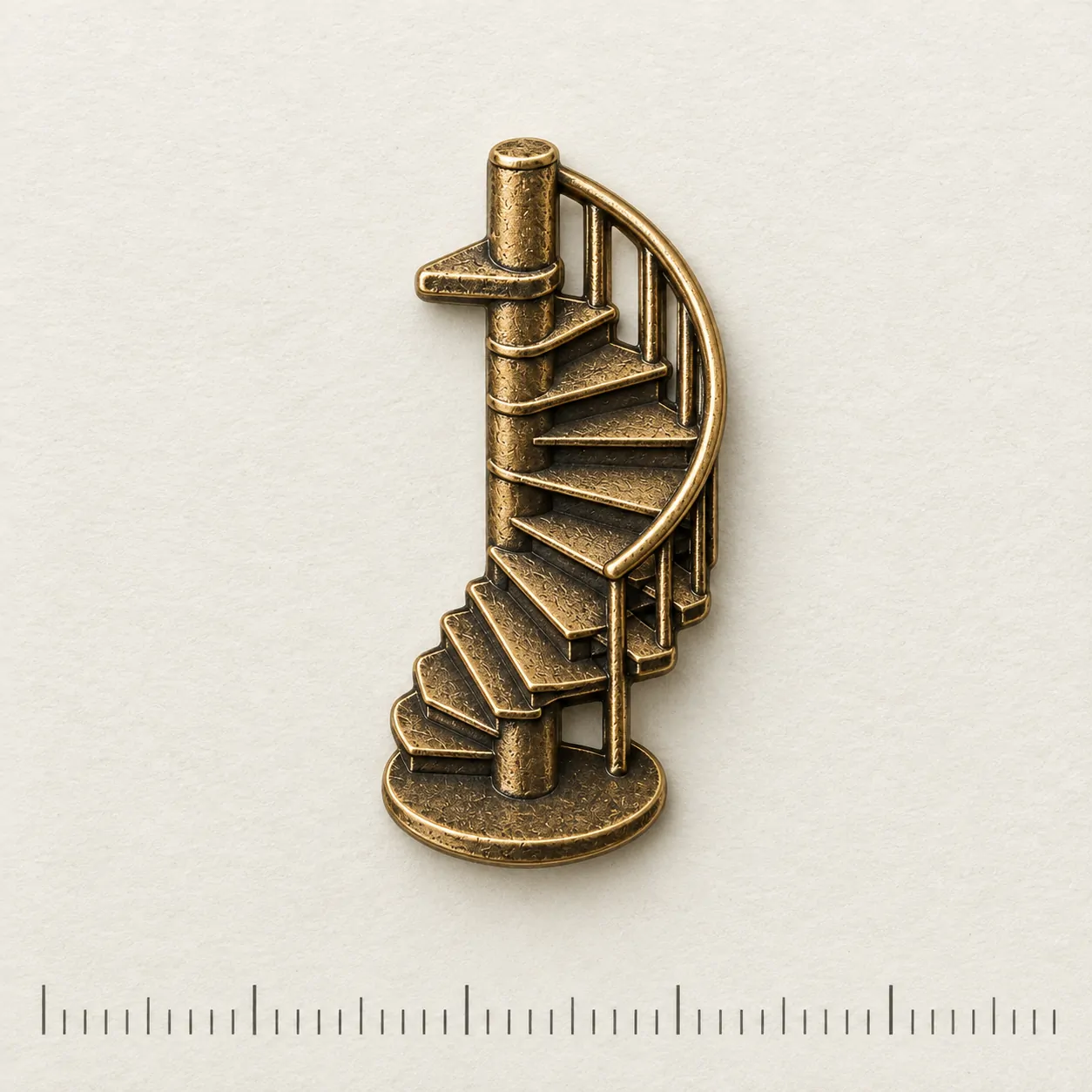 Spiral Stair Lapel Pin on a millimetre scale card