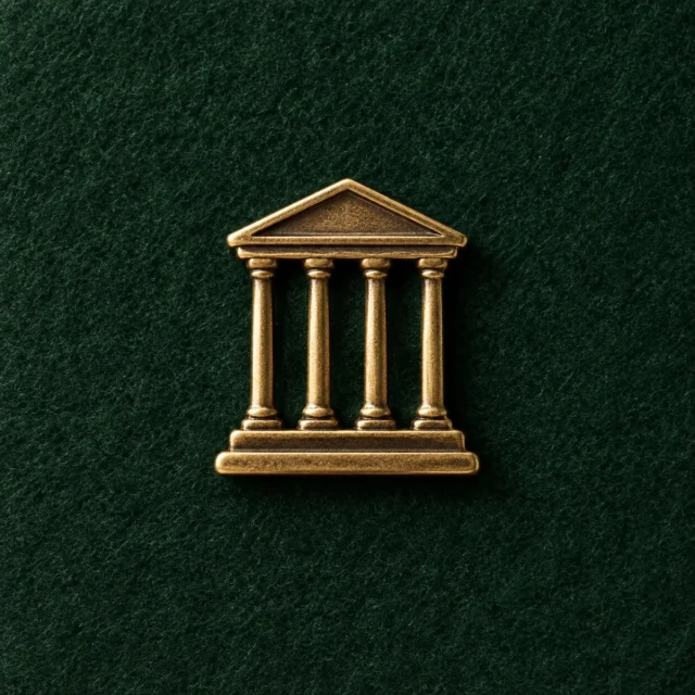 Temple Pediment Lapel Pin, front view on green felt