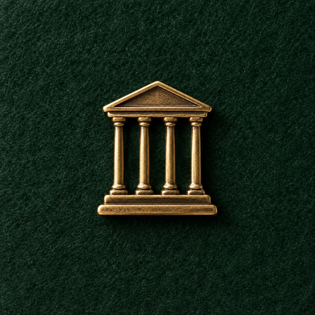 Temple Pediment Lapel Pin, front view on green felt