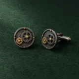 Twin Cogs Cufflinks, front view on green felt