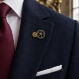 Twin Cogs Lapel Pin worn with a wedding suit